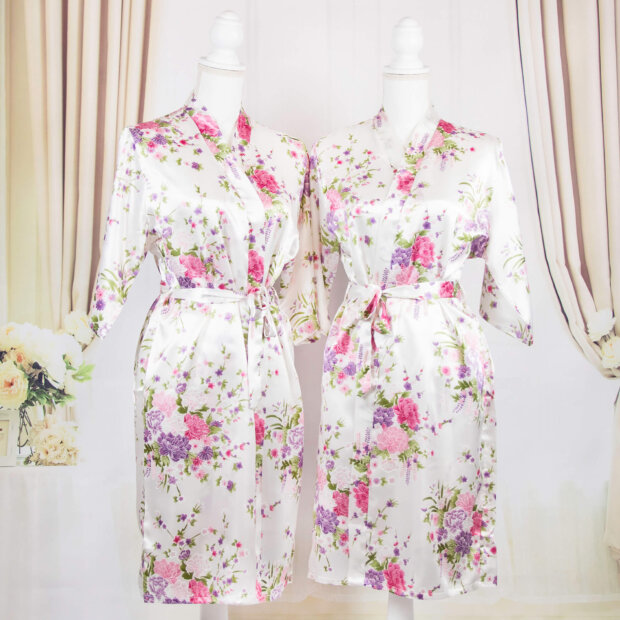white satin robe with floral designs