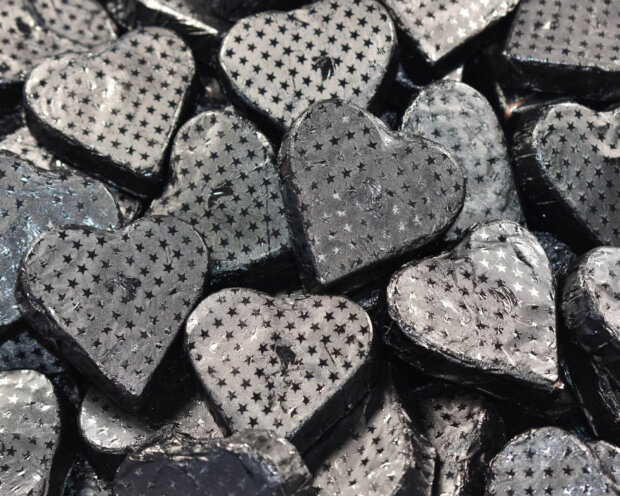 black embossed chocolate hearts