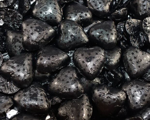 black embossed dark chocolate hearts
